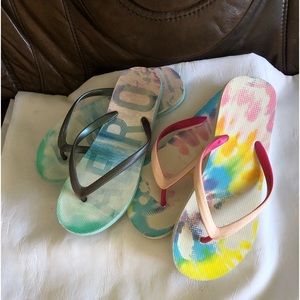 Two pairs of women’s flip flops sandals: AFRO and Aeropostale, size 7